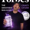 Crazy Cesar holding lubricant bottle for Shark Tank poster.